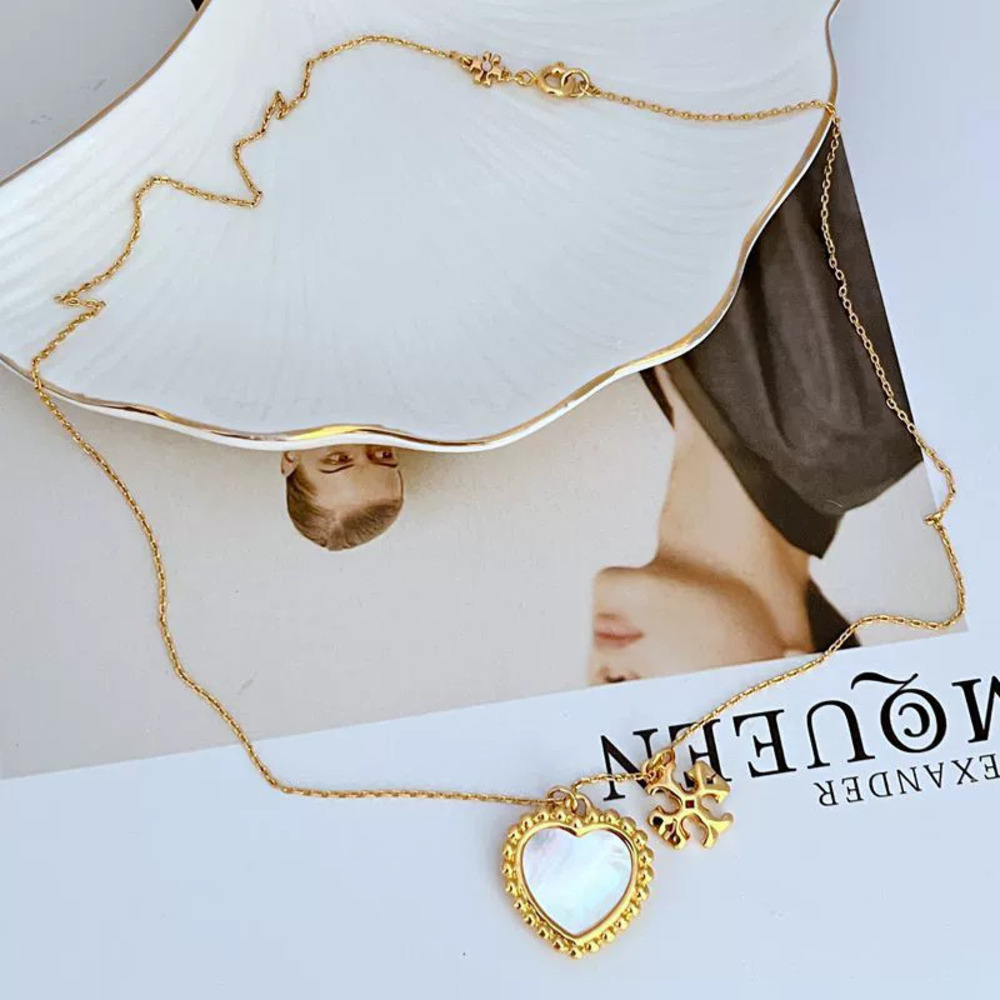 Tory Burch Natural Shell Inlaid Heart Shaped Letter Necklace
